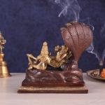 Pure Brass Resting Vishnu Lakshmi on Sheshanaag Idol - 6.9" Dual Tone Sculpture | Divine Couple Hindu Murti for Home Temple (133 characters)